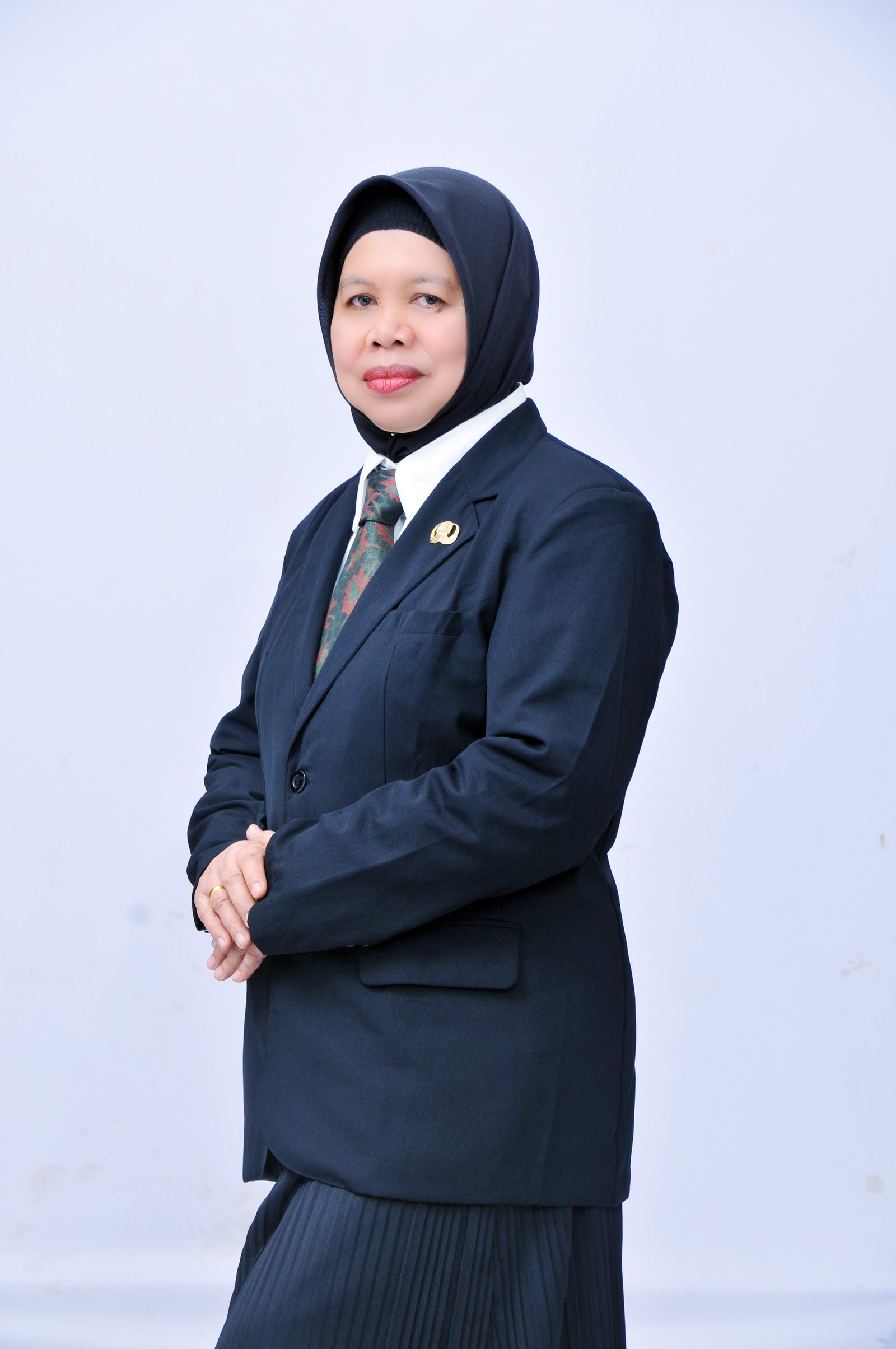 Dra. Siti Rostina, M.Pd